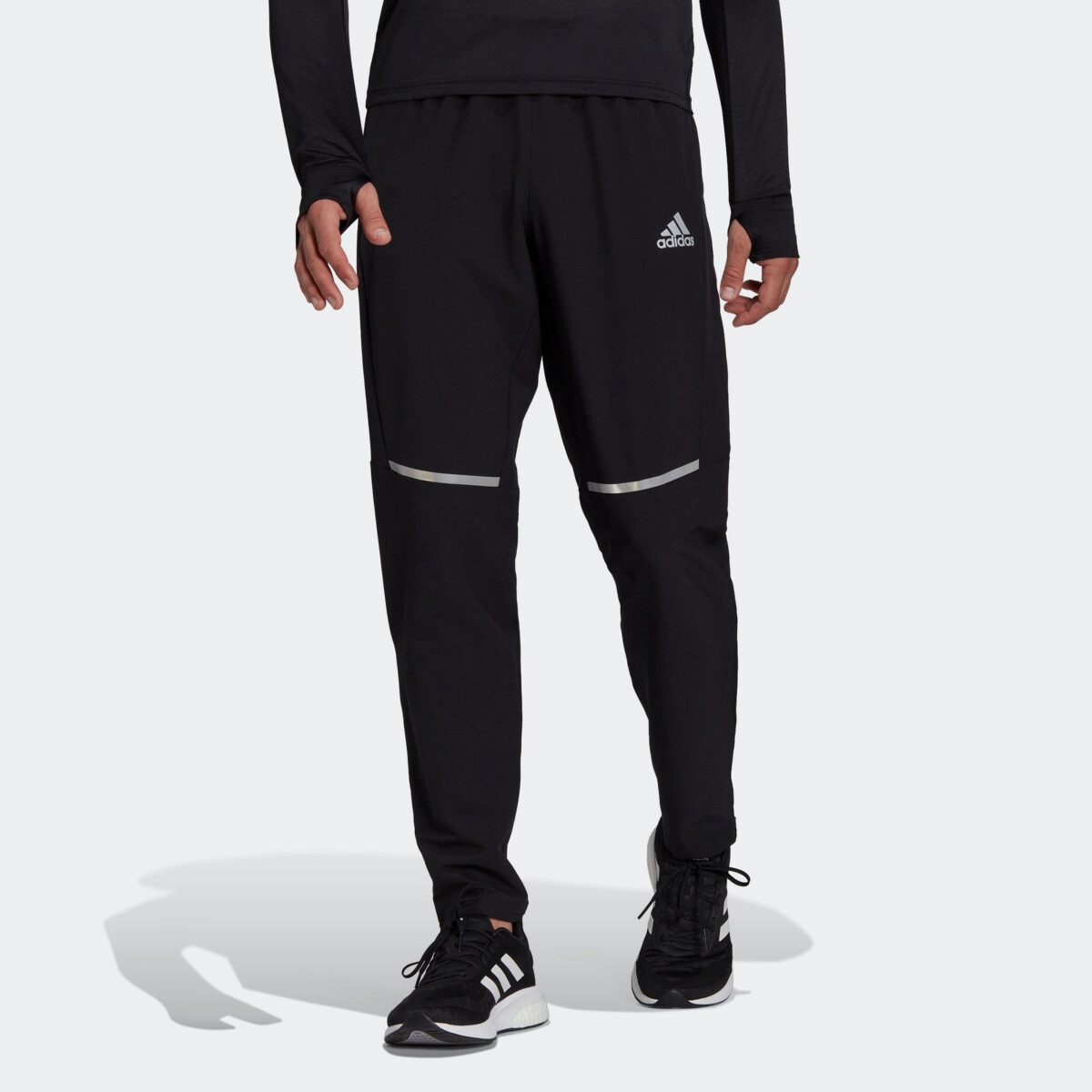 Adidas own the run soft shell joggers | Bikses | Sportland Outlet